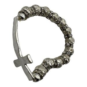 Silver Tone Stretch Bracelet with Ornate Beads and Side Cross Accent‎